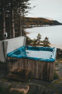 Portable hot tub near a lake